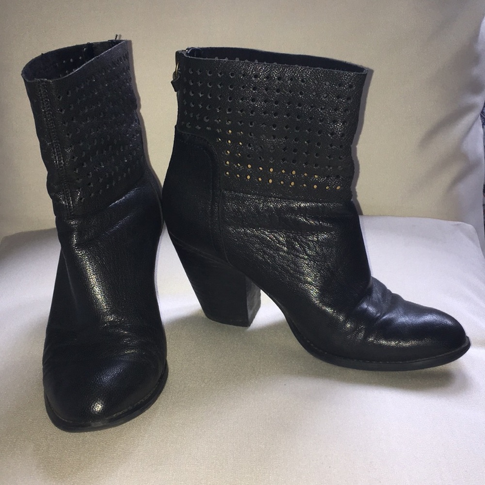 Black cutout booties by Nine West
